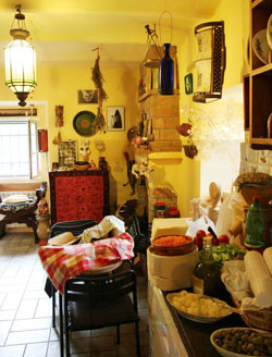 The warm, cozy kitchen of the Tarot Museum is so inviting